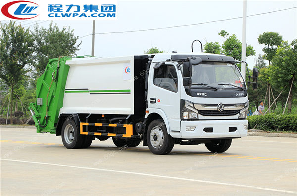 國(guó)六東風(fēng)凱普特壓縮垃圾車交付煙臺(tái)某鄉(xiāng)村居委會(huì)